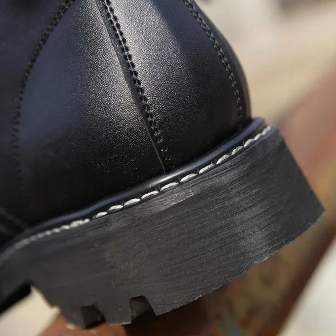 Black leather steel toe combat boots