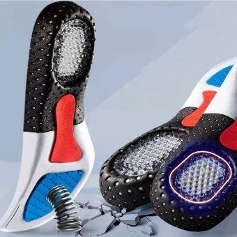 Shock absorbing insoles with arch support