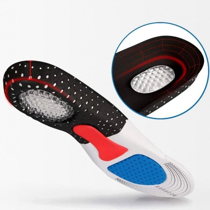 Shock absorbing insoles with arch support