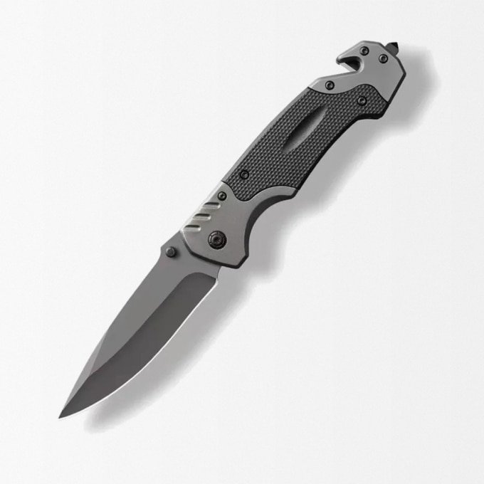 Tactical folding knife with glass breaker