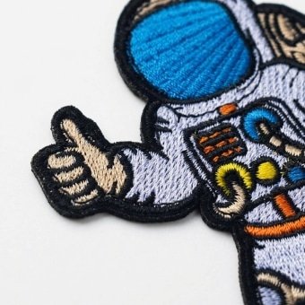 Thumbs up astronaut patch